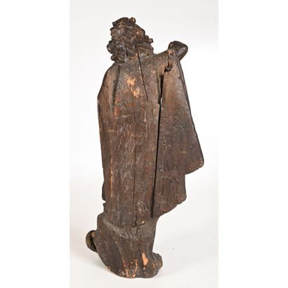 null SAINT MICHEL in carved oak with roughened back. He is shown standing, wearing...