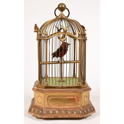 null BONTEMPS (Attributed to). LARGE octagonal whistling bird cage with gilded wood...
