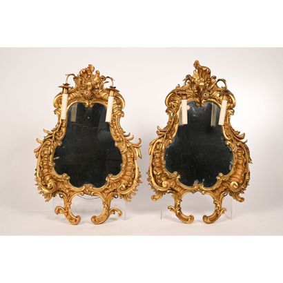 null SUITE OF 4 ITALIAN MIRRORS in the Rococo style, in gilded and carved wood. They...