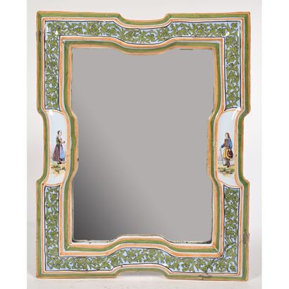 null DESVRES. GLACE with earthenware frame, decorated with green foliage and 2 Breton...