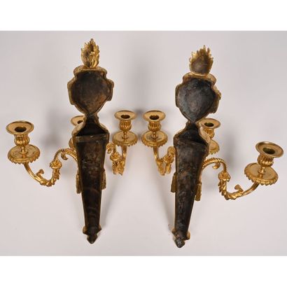 null Pair of LOUIS XVI gilt bronze wall lights (beautiful gilding). Model with 3...