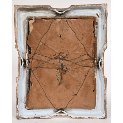 null DESVRES. GLACE with earthenware frame, decorated with green foliage and 2 Breton...