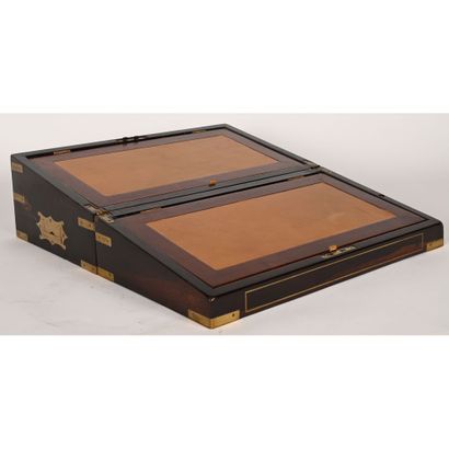null TRAVELLING WRITEBOOK in rosewood veneer and brass inlays. It has a double leather...