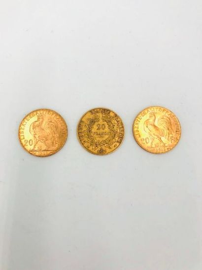 null A batch of 3 20 francs gold coins - 2 of which are from the Third Republic period...
