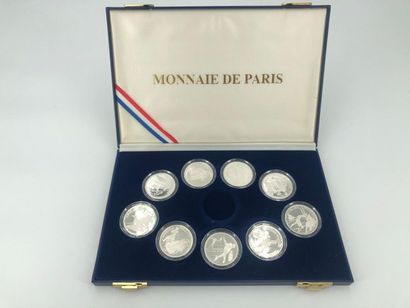 null A box of 9 coins of 100 silver francs commemorating the 1992 Albertville Olympic...