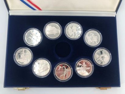 null A box of 9 coins of 100 silver francs commemorating the 1992 Albertville Olympic...