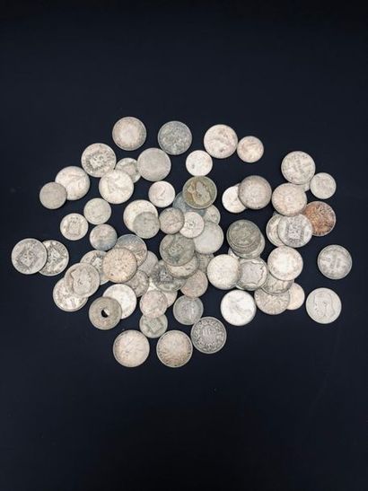 null A lot of 74 French and foreign silver coins from the 19th and 20th centuries...