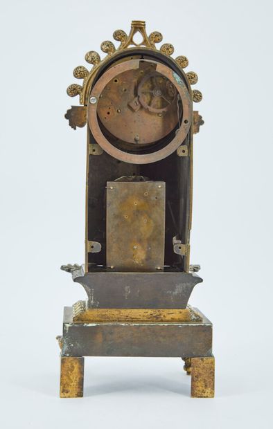 null Curious elements of a clock to be refixed in bronze and gilded brass representing...