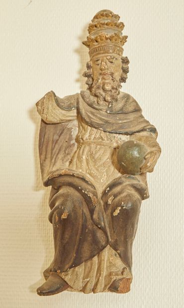 null * Figure papale portant la mitre et tenant un globe dans sa main gauche

Sculpture...