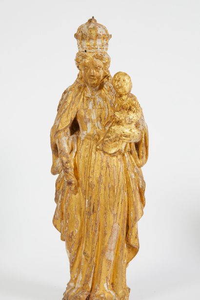 null * Petite Vierge à l'enfant en bois doré. La Vierge porte une couronne.

Époque...