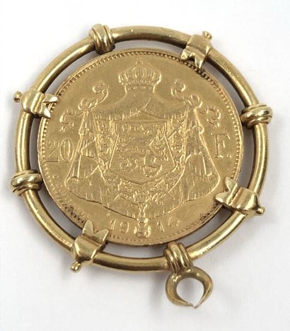 null Pendentif en or 750/1000 ornée d'une pièce de 20 franc or. Année 1914 à l'effigie...