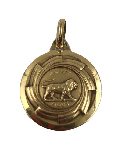 Médaille circulaire en or 750/1000 à décor...