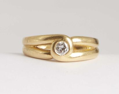 null Gold ring 750/1000e set in its center with a diamond of approximately 0.20carat....