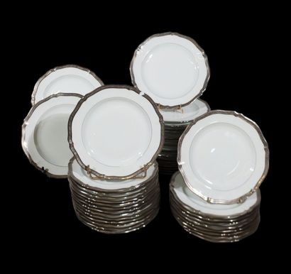 null LIMOGES RIBES
Part of a white porcelain dinner service with inlaid decoration...