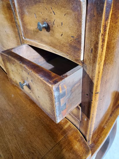 null BONHEUR DU JOUR in wood, opening with a drawer in the waist, seven drawers and...