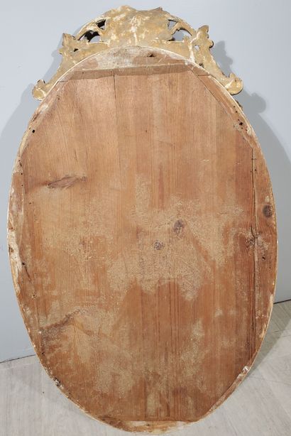null Transition Style MIRROR
Oval-shaped, in wood and stucco with a gilded patina,...