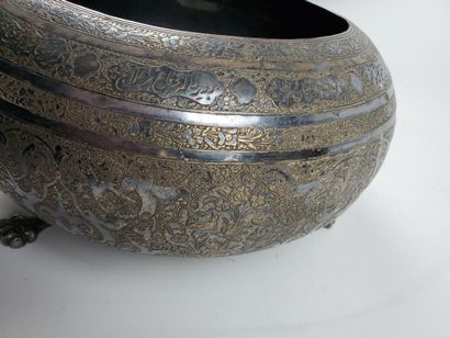 null Persian tripod basin
This Persian basin is in richly engraved silver, with a...