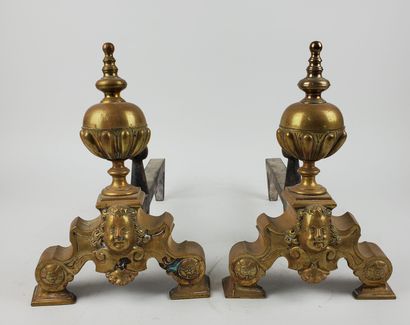 null Pair of bronze, brass and wrought iron "marmouset" andirons, the upper part...