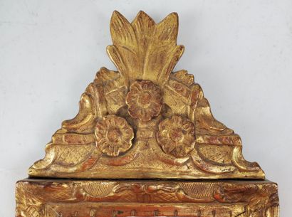 null MIRROR, carved and gilded wood frame, pediment decorated with three flower buds,...