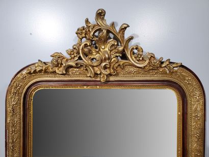null Louis-Philippe style MIRROR 
Wood and stucco with gilded patina, decorated with...