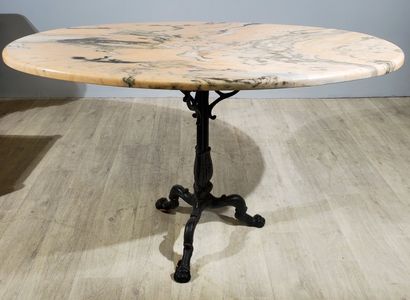 null Dining-room TABLE with oval marble top, wrought-iron tripod base with claw feet...