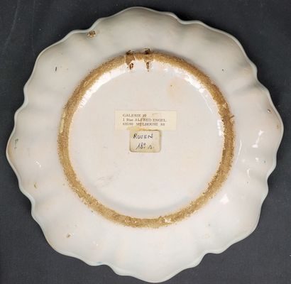 null ROUEN 
An earthenware compotier with a contoured rim and polychrome decoration...