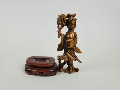null ASIAN ARTS
OEil de Tigre stone sculpture of a young woman with a basket and...