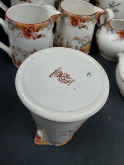 null SARREGUEMINES : 
Part of a tea service in polychrome porcelain with Asian decoration...
