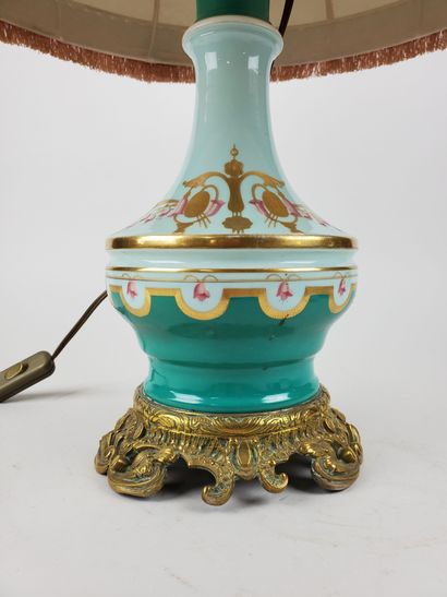 null LAMP PIED in turquoise blue, white and gilded polychrome porcelain, decorated...