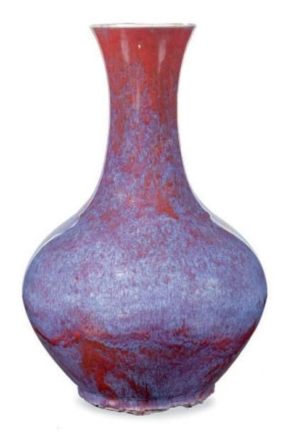 null Vase en porcelaine à glaçure flammée Chine, XXème siècle. La panse globulaire...