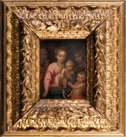 ECOLE ITALIENNE DU XVIIème SIECLE La Sainte Famille avec le jeune saint Jean Baptiste...