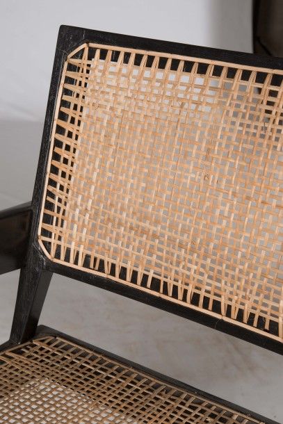 Pierre Jeanneret (1896-1967) 
Suite de quatre fauteuils dits Office chair
Canne de...