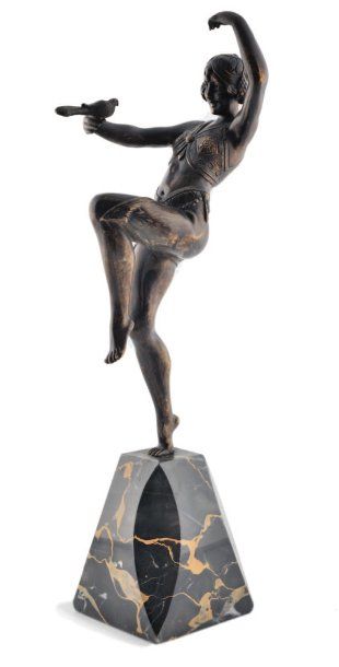Samuel LIPCHYTZ (1880-1943) Danseuse à l'oiseau. Bronze à patine brune nuancée. Signé....