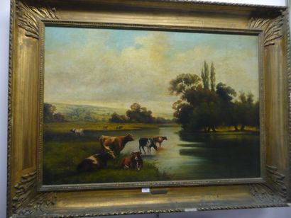 Adrien ROUSSEAU (XIX) Vaches au bord d'une rivière. Huile sur toile. Signée en bas...