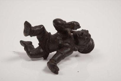 null Statuette en bronze représentant Krishna enfant



Inde, XIXème siècle



H...