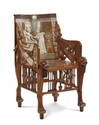 FAUTEUIL TRONE DE TOUTÂNKHAMON en bois sculpté avec incrustations de nacre et d’ivoire....