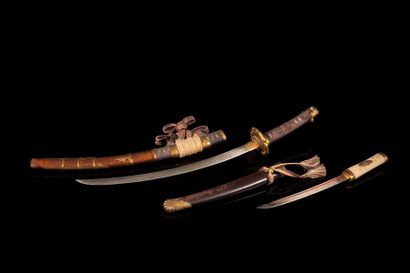 null Deux armes japonaises miniatures 

A set of two miniature swords, Japan, 20th...