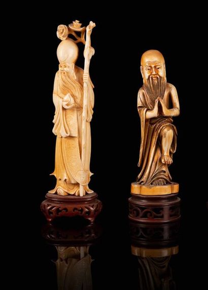 null Ensemble de deux sujets 

A set of two ivory figures, China, first half of 20th...