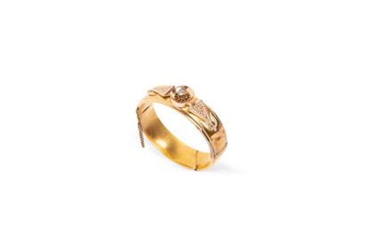 null Bracelet jonc en alliage d'or jaune et rose (585 millièmes) ouvrant et articulé...