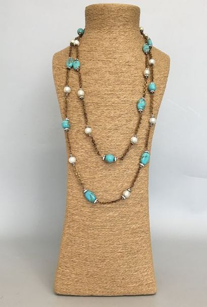null Attributed to CHANEL Long necklace in patinated metal turquoise glass beads...
