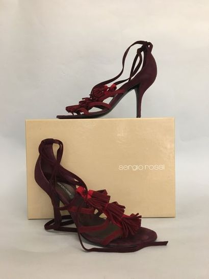 null SERGIO ROSSI Pair of shoes with lace-up strap and pompom in plum and red suede...