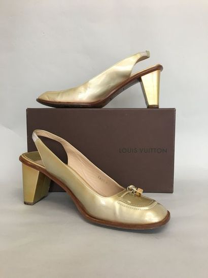 null LOUIS VUITTON Pair of gold patent leather strappy pumps with cubic golden metal...