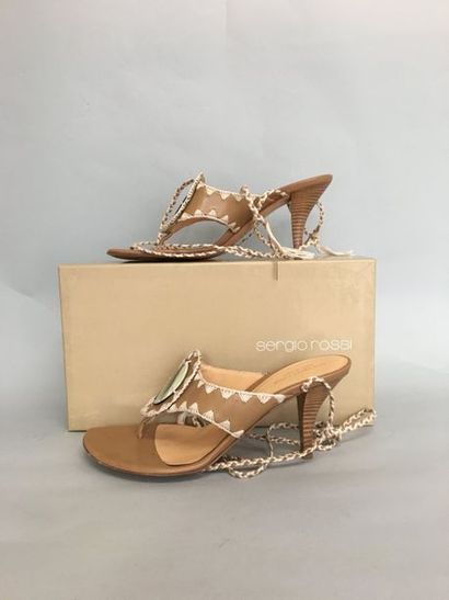 null SERGIO ROSSI Pair of open shoes with lace-up strap in cream leather stitched...