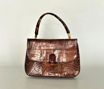 Fawn crocodile bag with clasp and handle...