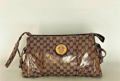 GUCCI Large oilcloth clutch bag with brown...