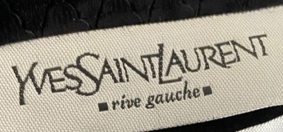null Yves SAINT LAURENT LAURENT Rive Gauche Black woollen skirt with cut-out stripes...