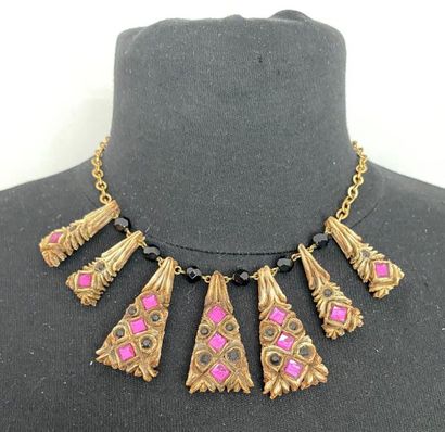 null Gold plated metal necklace with talosel pendants adorned with pink rhinestones...