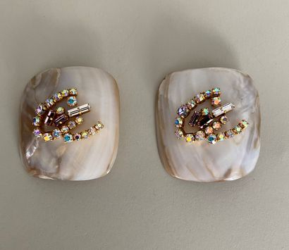 null CHRISTIAN LACROIX Pair of mother-of-pearl ear clips with the brand's number...