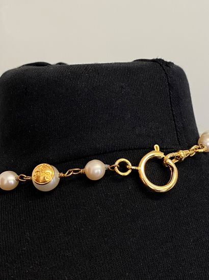 null CHANEL Made in France Long necklace made of pearly pearls and guilloched gold...