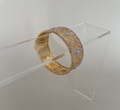 null Rigid articulated bracelet in gilded metal decorated with zirconium oxides in...